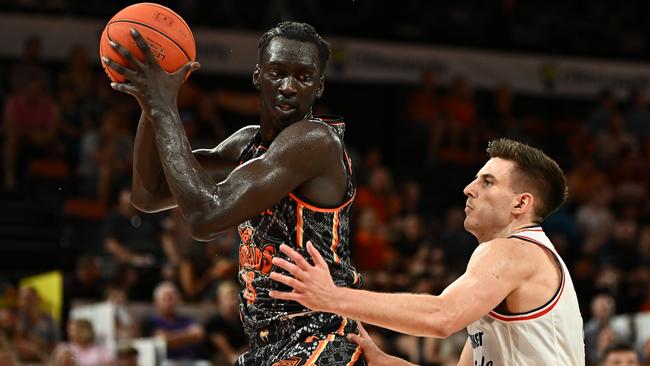 CAIRNS, AUSTRALIA - JANUARY 13: Akoldah Gak of the Taipans catches the rebound during the round 15 NBL match between Cairns Taipans and Adelaide 36ers at Cairns Convention Centre, on January 13, 2024, in Cairns, Australia. (Photo by Emily Barker/Getty Images)