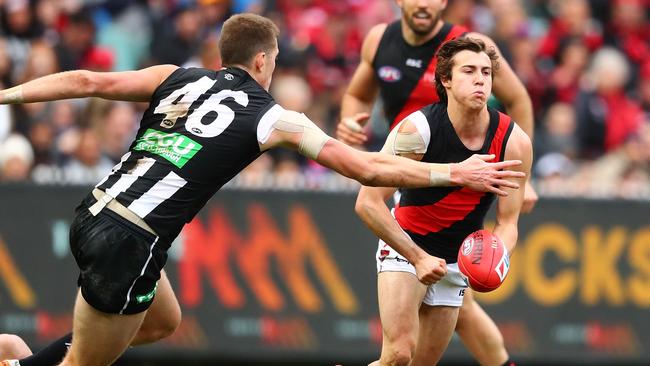 Essendon’s Andrew McGrath is too slick for Mason Cox. Picture: Getty Images