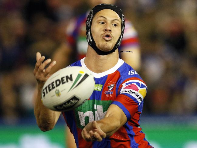 Kalyn Ponga of the Knights passes the ball during the Round 16 NRL match between the Newcastle Knights and the Canterbury-Bankstown Bulldogs at McDonald Jones Stadium in Newcastle, Saturday, June 30, 2018. (AAP Image/Darren Pateman) NO ARCHIVING, EDITORIAL USE ONLY