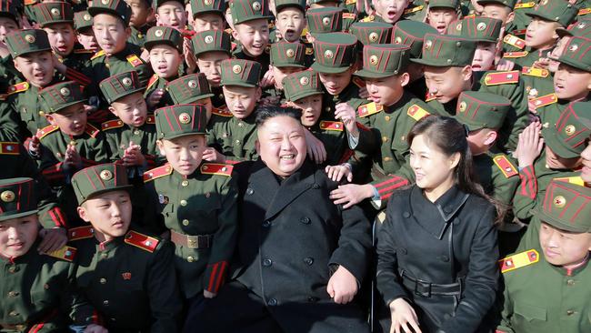 This March 2, 2017 picture released by North Korean news agency, KCNA (Korean Central News Agency) on March 3, 2017 shows North Korean leader Kim Jong-Un (C) and his wife Ri Sol-Ju (front 2nd R) visiting the Mangyongdae Revolutionary School in Pyongyang to plant trees with its students on the Tree-planting Day. REPUBLIC OF KOREA OUT ---EDITORS NOTE--- RESTRICTED TO EDITORIAL USE - MANDATORY CREDIT "AFP PHOTO / KCNA VIA KNS" - NO MARKETING NO ADVERTISING CAMPAIGNS - DISTRIBUTED AS A SERVICE TO CLIENTS / AFP PHOTO / KCNA VIA KNS / STR / South Korea OUT / REPUBLIC OF KOREA OUT   ---EDITORS NOTE--- RESTRICTED TO EDITORIAL USE - MANDATORY CREDIT "AFP PHOTO/KCNA VIA KNS" - NO MARKETING NO ADVERTISING CAMPAIGNS - DISTRIBUTED AS A SERVICE TO CLIENTS THIS PICTURE WAS MADE AVAILABLE BY A THIRD PARTY. AFP CAN NOT INDEPENDENTLY VERIFY THE AUTHENTICITY, LOCATION, DATE AND CONTENT OF THIS IMAGE. THIS PHOTO IS DISTRIBUTED EXACTLY AS RECEIVED BY AFP.    / REPUBLIC OF KOREA OUT ---EDITORS NOTE--- RESTRICTED TO EDITORIAL USE - MANDATORY CREDIT "AFP PHOTO / KCNA VIA KNS" - NO MARKETING NO ADVERTISING CAMPAIGNS - DISTRIBUTED AS A SERVICE TO CLIENTS