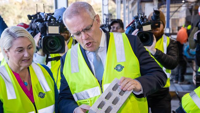 Liberal candidate for the Tasmanian seat of Lyons Susie Bower and Mr Morrison on the campaign trail. Picture: Jason Edwards