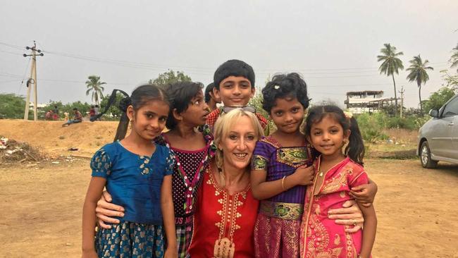 Destiny Rescue CEO Michelle Winser with some of the child sex slaves rescued from a brothel by Destiny Rescue. Picture: Contributed