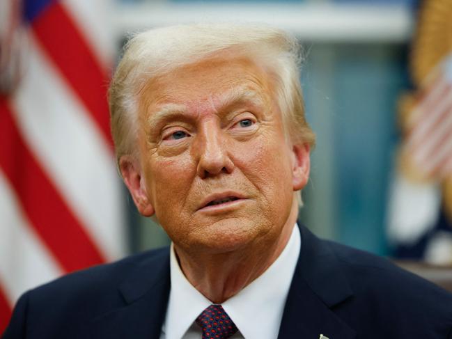 WASHINGTON, DC - JANUARY 20: President Donald Trump signs executive orders in the Oval Office on January 20, 2025 in Washington, DC. Trump takes office for his second term as the 47th president of the United States.   Anna Moneymaker/Getty Images/AFP (Photo by Anna Moneymaker / GETTY IMAGES NORTH AMERICA / Getty Images via AFP)