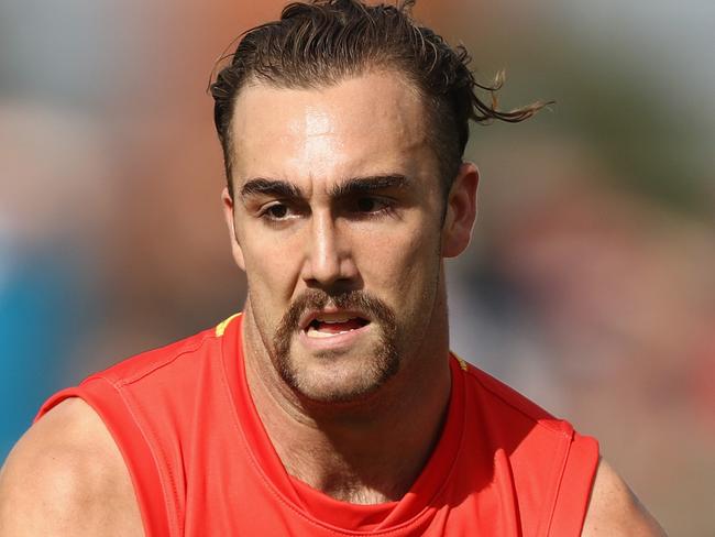 BALLARAT, AUSTRALIA - MAY 05:  Brayden Crossley of the Suns handballs during the round seven AFL match between the Western Bulldogs and the Gold Coast Suns at Mars Stadium on May 5, 2018 in Ballarat, Australia.  (Photo by Robert Cianflone/Getty Images)