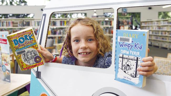 Millie Watkins, 9, at the Robina library. Picture: Tertius Pickard