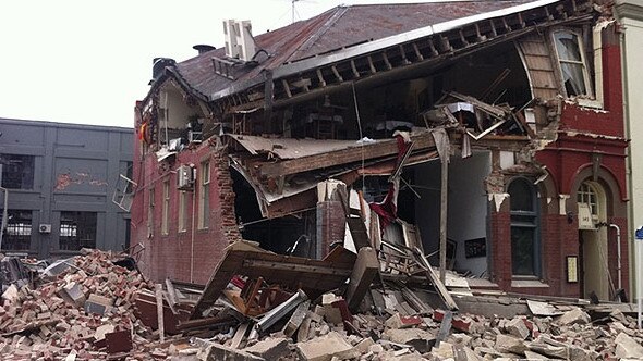 Earthquake disaster in Christchurch, New Zealand - collapsed building on Worcester Street, Christchurch after Feb 2011 earthquake.