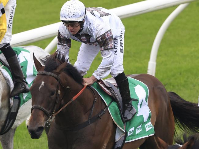 KEMBLA GRANGE, AUSTRALIA - NOVEMBER 20: Brock Ryan on Count De Rupee wins race 8 the TAB Gong during Sydney Racing at Kembla Grange Racecourse on November 20, 2021 in Kembla Grange, Australia. (Photo by Mark Evans/Getty Images)