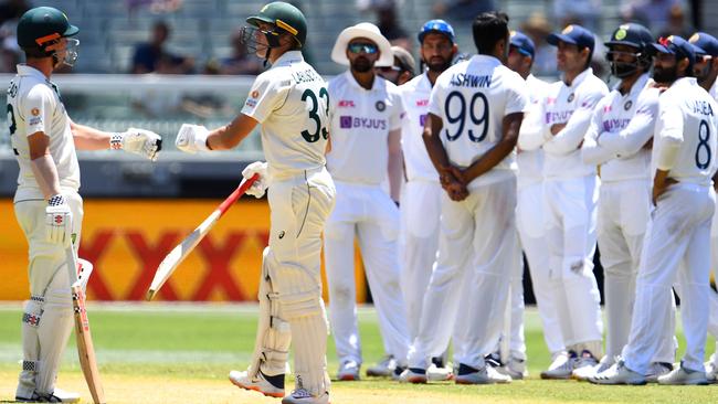 Australia’s Travis Head and Marnus Labuschagne bump fists. Picture: AFP