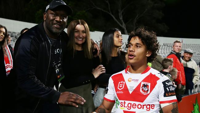 Tristan Sailor (right) shakes hands with his father Wendell Sailor after a Dragons match in 2019. Picture: Matt King/Getty Images