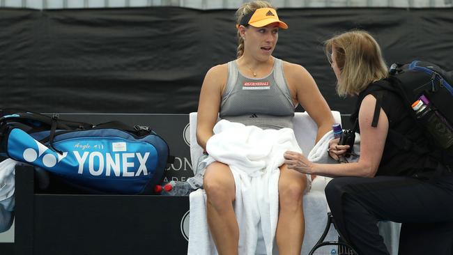 Angelique Kerber is attended to by the physio during her singles match against Dayana Yastremska. Picture: Getty Images