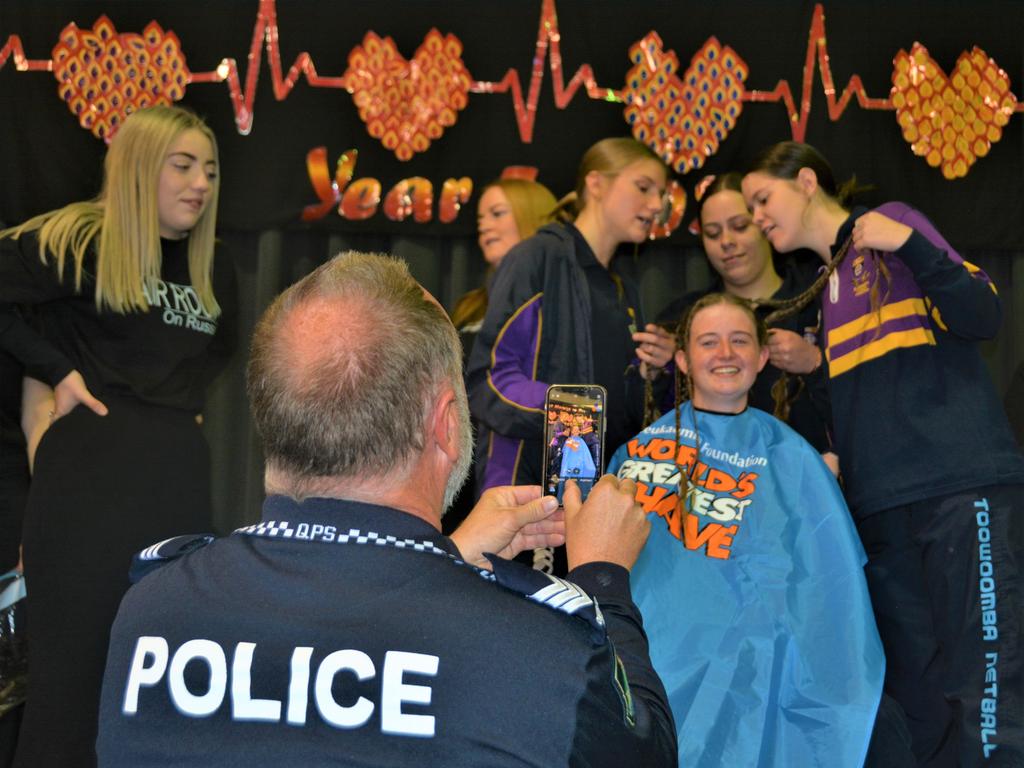 At the St Joseph's College 2023 World's Greatest Shave event is Jordan Steinhardt surrounded by her support crew. Picture: Rhylea Millar