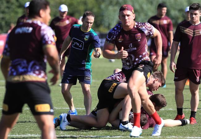 NRL referee Alan Shortall (green) in camp with the Maroons. Picture: Adam Head