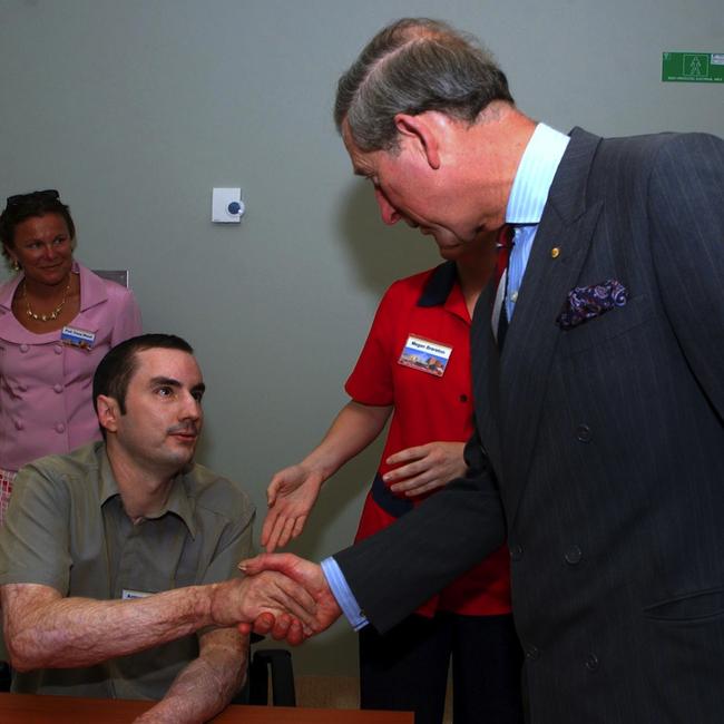 Britain's Prince Charles meets Antony Svilicich in the Hand Therapy Room at the Royal Perth Hospital in Perth in 2005. Picture: AAP ImageRick Rycroft