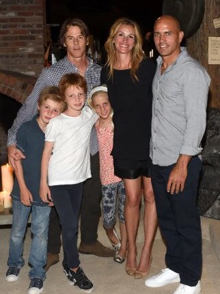 She usually keeps her kids (pictured here with Kelly Slater) out of the spotlight. Picture: Instagram