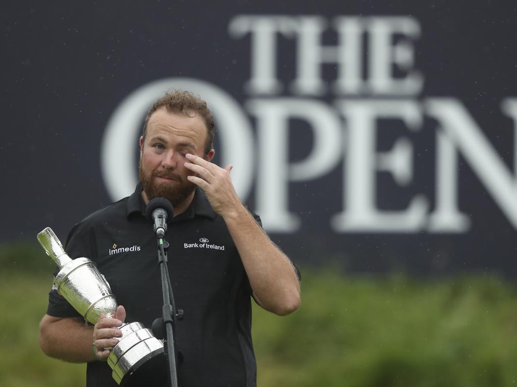 Ireland's Shane Lowry wipes away a tear as he makes a speech. (AP Photo/Jon Super)