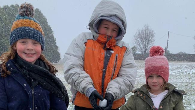 SNOW FUN: Lismore youngsters Kiani Small, Jonah Mitchell and Kalli Small had a wonderful time in the snow at Guyra.