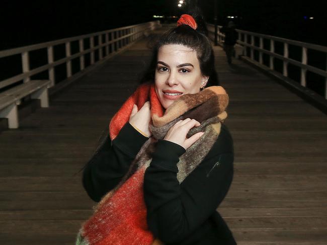 Elina Konstantopoulou rugs up on Kerferd Road Pier with the first day of winter. Picture : Ian Currie