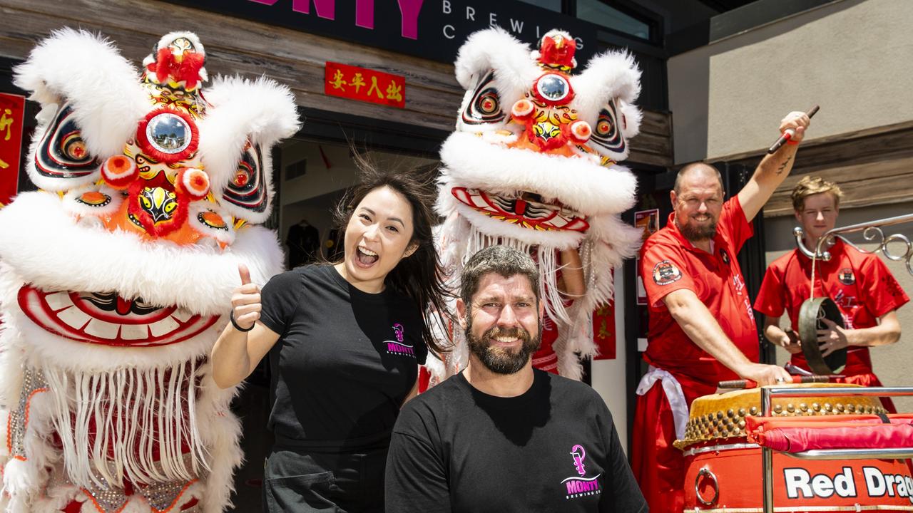 Monty Brewing Co owners Valerie Chua and Nathan Semmens with Red Dragon Martial Arts Lion Dance Troup members Brett Fenton (drums) and Beau Kennedy at Chinese New Year celebrations at the Highfields venue. Picture: Kevin Farmer