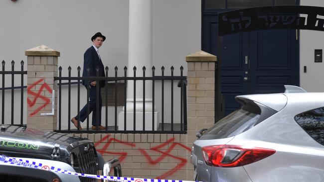 A Jewish Australian attends Newtown Synagogue the morning after vandals defaced it with anti-Semitic graffiti in January.