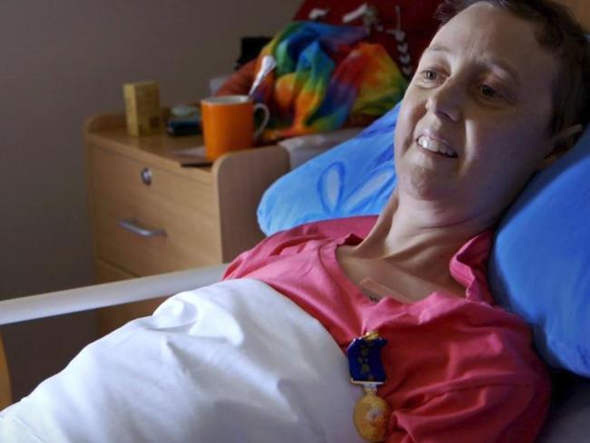 Connie Johnson receiving her Order of Australia medal while in her hospice bed, just days before she died. Picture: Love Your Sister/Facebook