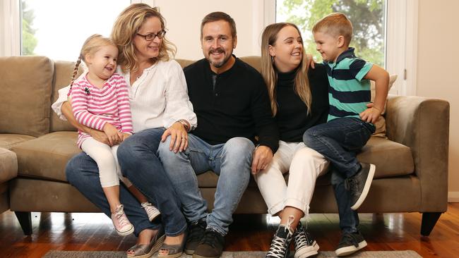 Koos Kruger, pictured with wife Davina, his daughter Linze and two little one's Ashton and Chelsea, believes all Aussies should share in the benefits of tax breaks. Picture: Sam Ruttyn