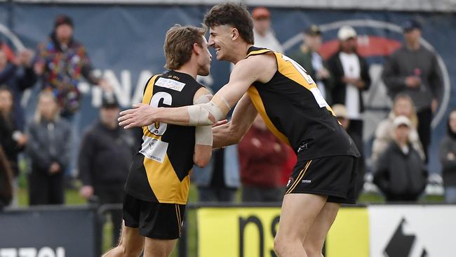 Brody Tardio and Mitch Jorgensen celebrate a Heidelberg goal. Picture: Andrew Batsch