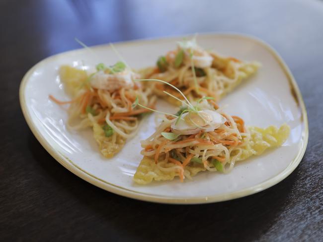 Crisp start: Moreton Bay bugs on wonton wrappers with toasted sesame coleslaw and blackened chilli mayo. Picture: Mark Cranitch