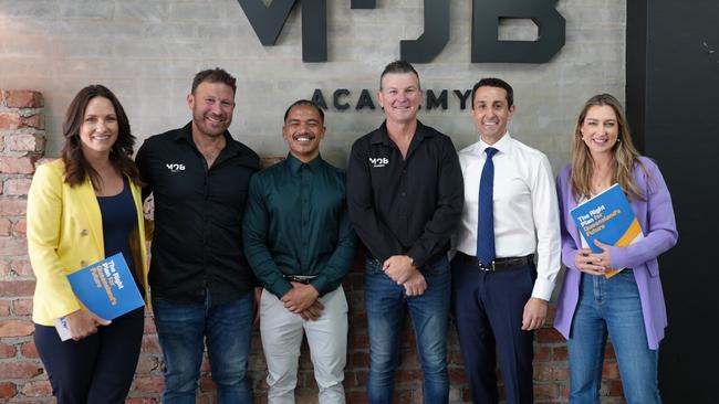 LNP Gaven candidate Bianca Stone, Men of Business Academy founder and CEO Marco Renai, graduate Haami, Men of Business Academy CEO Jason Sessarago, LNP leader David Crisafulli and Shadow Youth Justice Minister Laura Gerber at the Men of Business Academy premises in Southport.