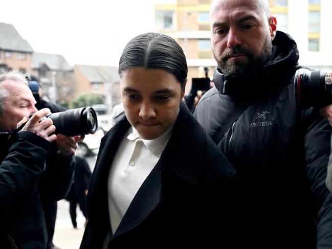 Sam Kerr (C) arrives at a London court. The Australia captain is on trial charged with causing racially aggravated harassment, which she denies, to a police officer. Picture: AFP