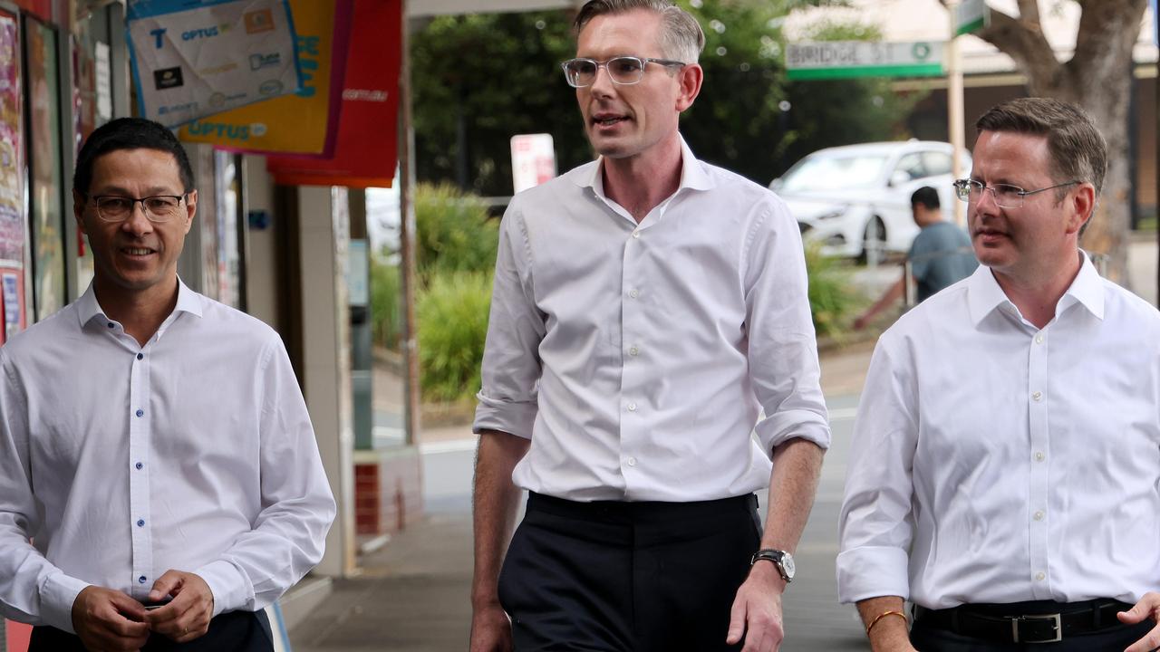 NSW Premier Dominic Perrottet pictured walking the streets of Penshurst with local liberal candidates, candidate for Kogarah Craig Chung (left) and Mark Coure Member for Oatley (right). Picture: NCA NewsWire / Damian Shaw