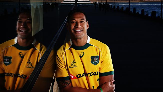 Israel Folau of the Australian Wallabies rugby team poses for a photo with the Sydney Opera House in the background during the 2014 Wallabies rugby jersey launch at the Park Hyatt hotel in Sydney. Pic Brett Costello