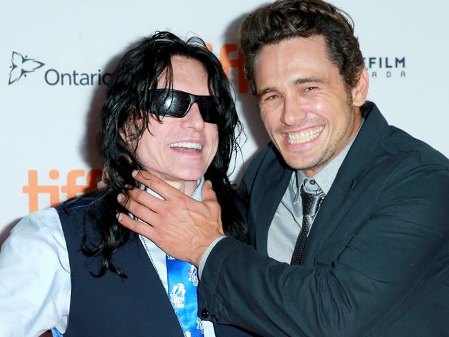 TORONTO, ON - SEPTEMBER 11:  Tommy Wiseau (L) and James Franco attend premiere of film 