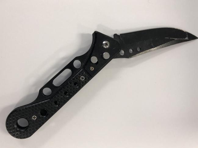 Parolee had knives in his pockets while meeting with parole officer