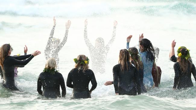 GOLD COAST, AUSTRALIA - JULY 11: Alex Pullin's girlfriend Ellidy Vlug and friends and family pay respects in memory of Alex 'Chumpy' Pullin on July 11, 2020 in Gold Coast, Australia. Australian Winter Olympic Games Snowboarder Alex 'Chumpy' Pullin died on Wednesday 8 July in a drowning accident while spearfishing at Palm Beach on the Gold Coast, aged 32. (Photo by Chris Hyde/Getty Images)