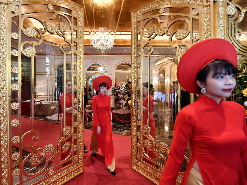 Staff wait to welcome guests in the lobby of the newly inaugurated Dolce Hanoi Golden Lake hotel on Thursday. Picture: Manan Vatsyayana/AFP