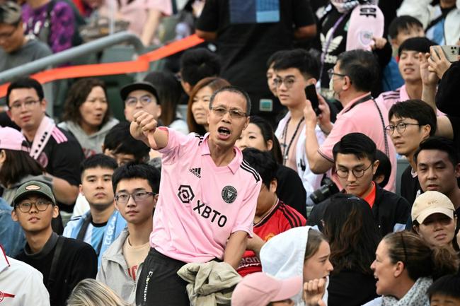 Fans react angrily after Lionel Messi failed to take part in a pre-season friendly in Hong Kong