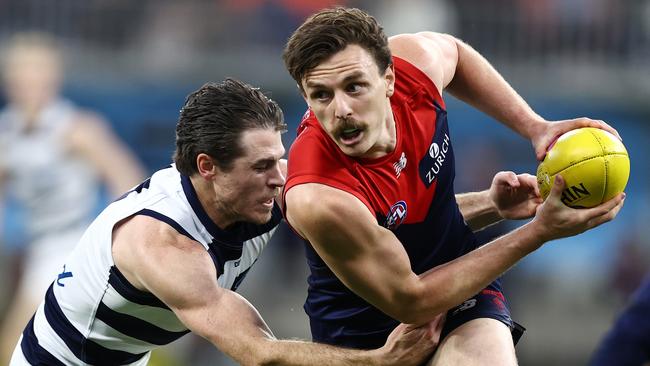 All Australian defender Jake Lever clears in front of Isaac Smith. Picture: Michael Klein