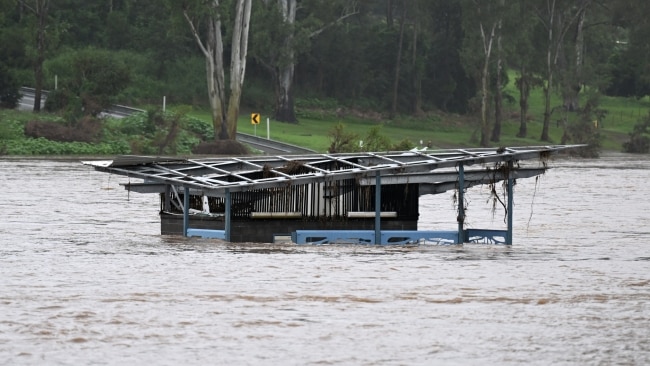 Recreational equipment is inundated by floodwater in Ipswich on Friday. Picture: Dan Peled/Getty Images