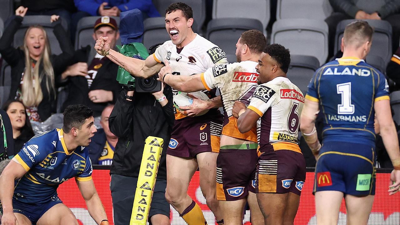 Corey Oates celebrates adding to his tryscoring tally against the Eels. Picture: Cameron Spencer/Getty Images