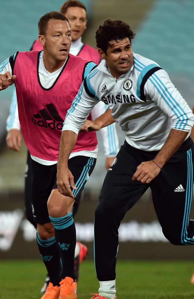 Chelsea captain John Terry (left) and striker Diego Costa at Chelsea’s Monday night training session at ANZ Stadium.