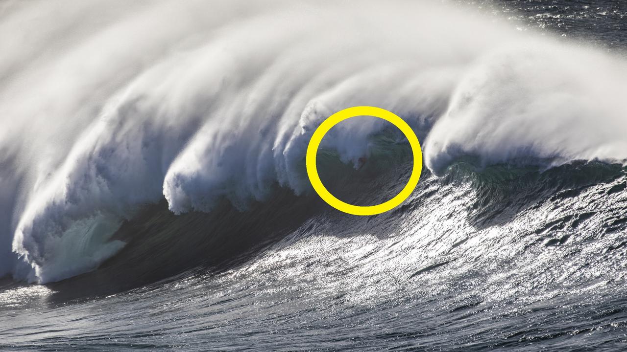 Legendary Brazilian waterman Kalani Lattanzi bodysurfs a 25ft Wedding Cake Island set wave. Photograph Dallas Kilponen.