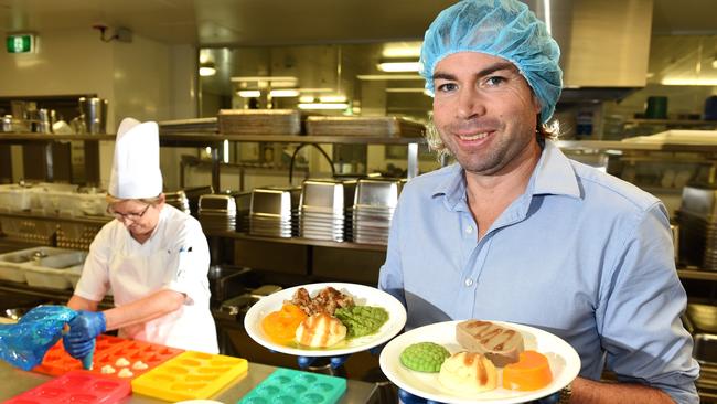 Zane Hopper won a grant up to $25,000 for his vitamising machine which allows pureed food for sick patients in hospitals to be moulded into actual lookalike food. Here with Cook Debbie Allison. Picture: John Gass