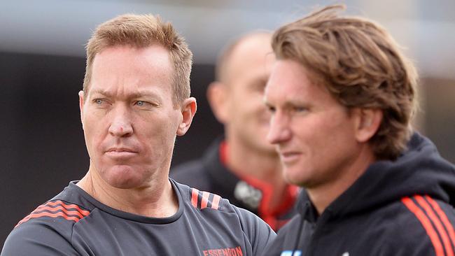 Dean Robinson with James Hird at Essendon training.