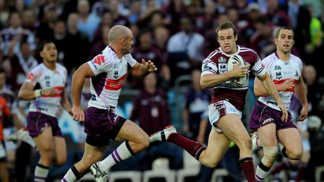 Michael Robertson landed a grand final hat-trick against the Storm.