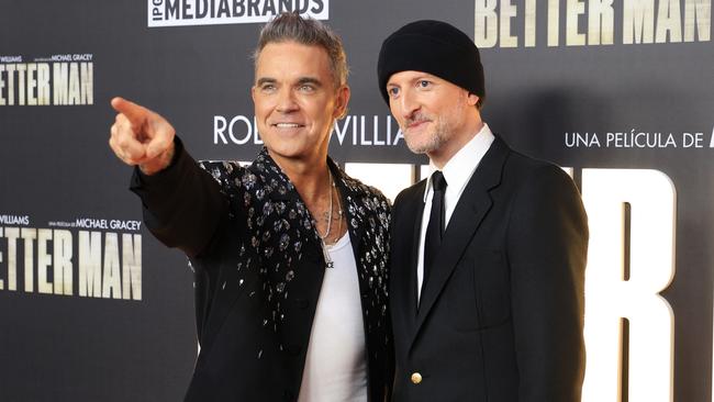 Robbie Williams with Michael Gracey who directed the film Better Man. Pic: Getty Images