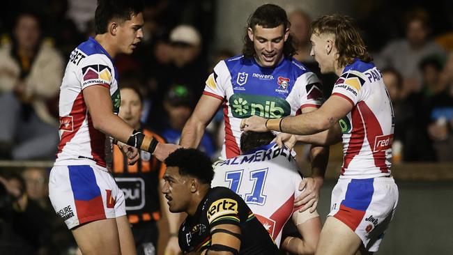 Dylan Lucas (11) scores his third try against the Panthers. (Photo by Mark Evans/Getty Images)