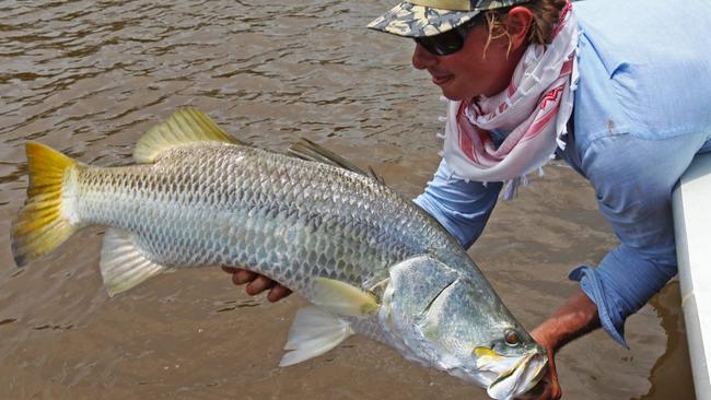 Jed Dupe releasing one of several big chrome Barra he caught in Chambers bay recently.