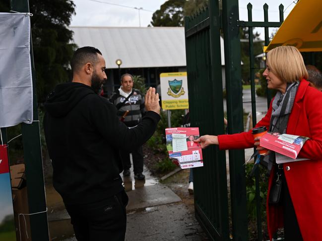 A voter rejects Kristina Keneally’s how to vote card.