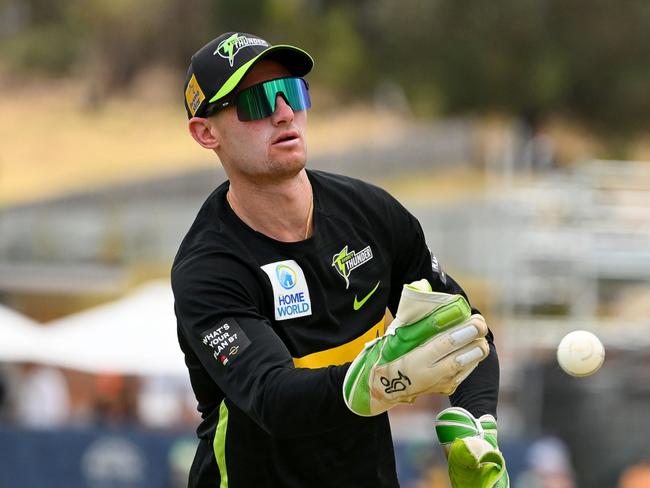 ALBURY, AUSTRALIA - DECEMBER 23: Cameron Bancroft of Sydney Thunder warms up ahead of the BBL match between Melbourne Stars and Sydney Thunder at Lavington Sports Ground, on December 23, 2023, in Albury, Australia. (Photo by Morgan Hancock/Getty Images)