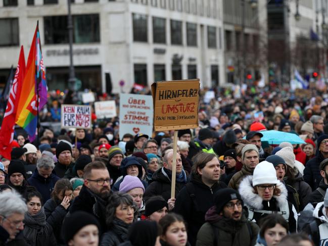 People attend a pro-democracy demonstration in front of the Brandenburg Gate following allegations that members of the Alternative for Germany (AfD) political party recently met with known neo-Nazis. Picture: Getty